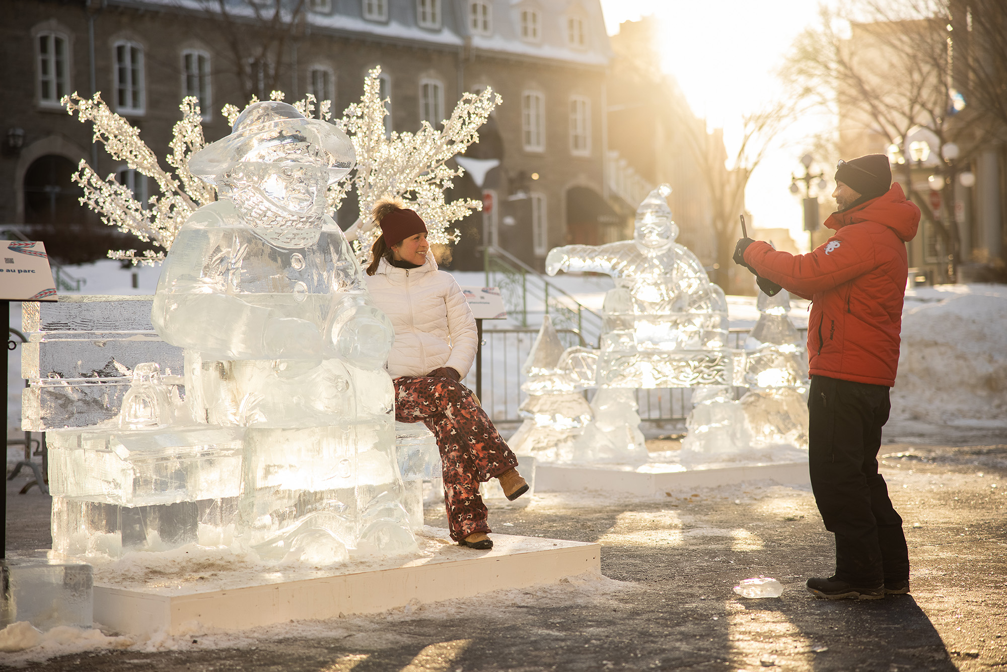 couple enjoying the ice sculptures at Carnaval de Quebec